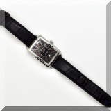 J111. E. Townsend Nantucket watch with black leather band. Clear back. Running. - $495